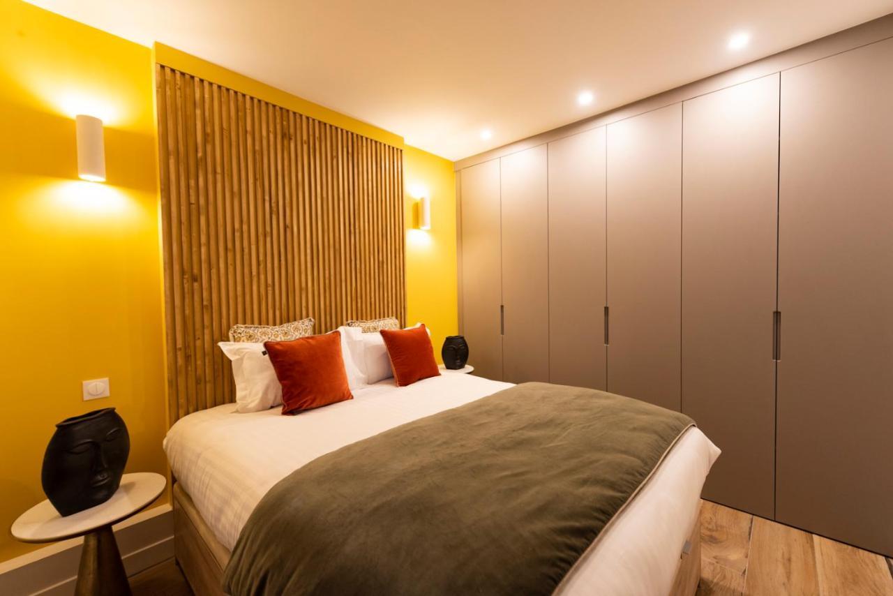 Au Pied De La Tour Apartment Париж Екстериор снимка
