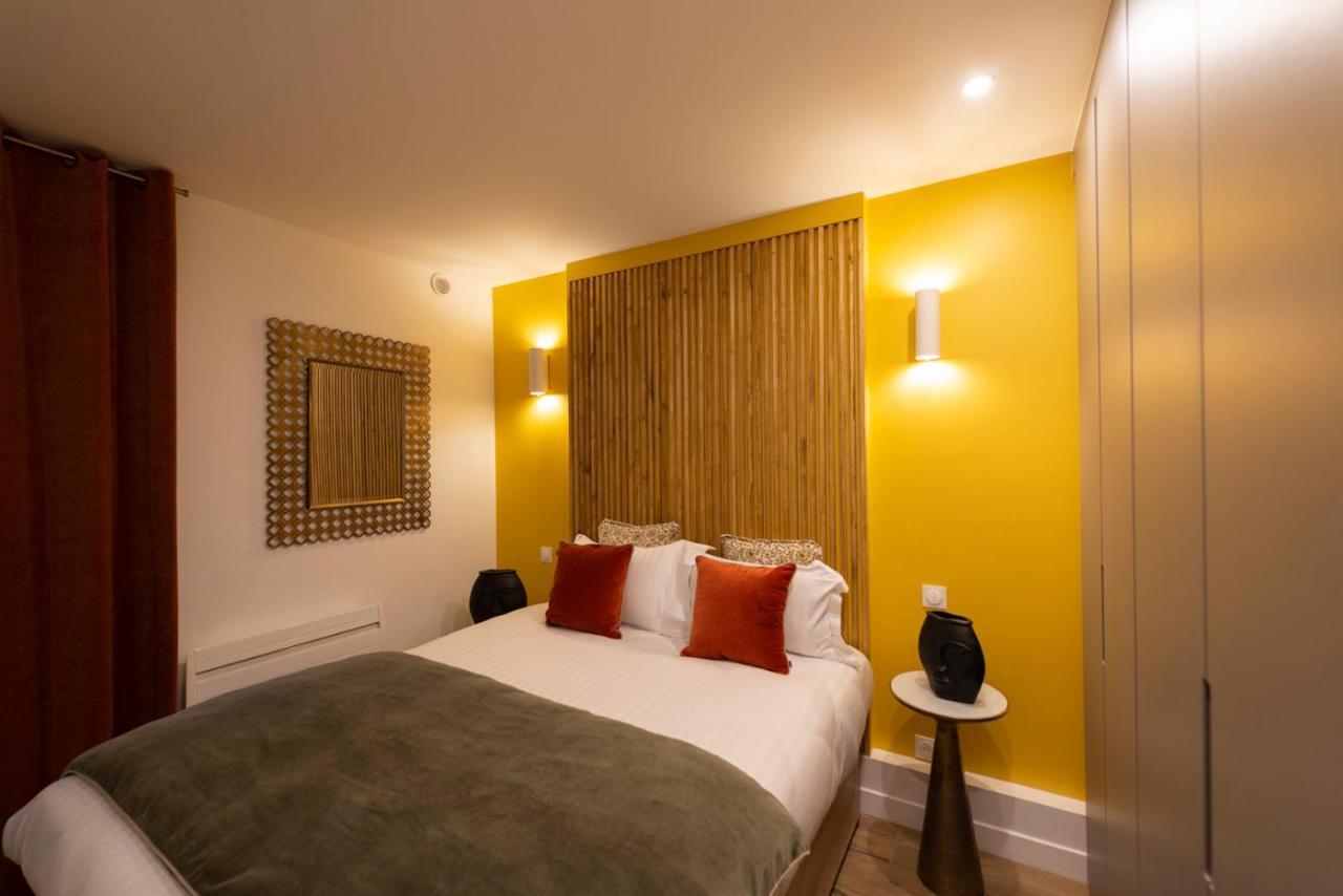 Au Pied De La Tour Apartment Париж Екстериор снимка